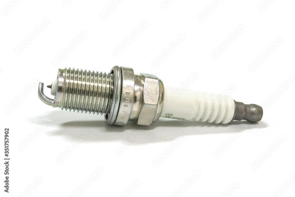 New spark plug on white background, isolated. New spark plug on white background, isolated.