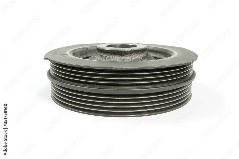 Old crankshaft pulley on white background, isolated, Car maintenance service. Old crankshaft pulley on white background, isolated, Car maintenance service.