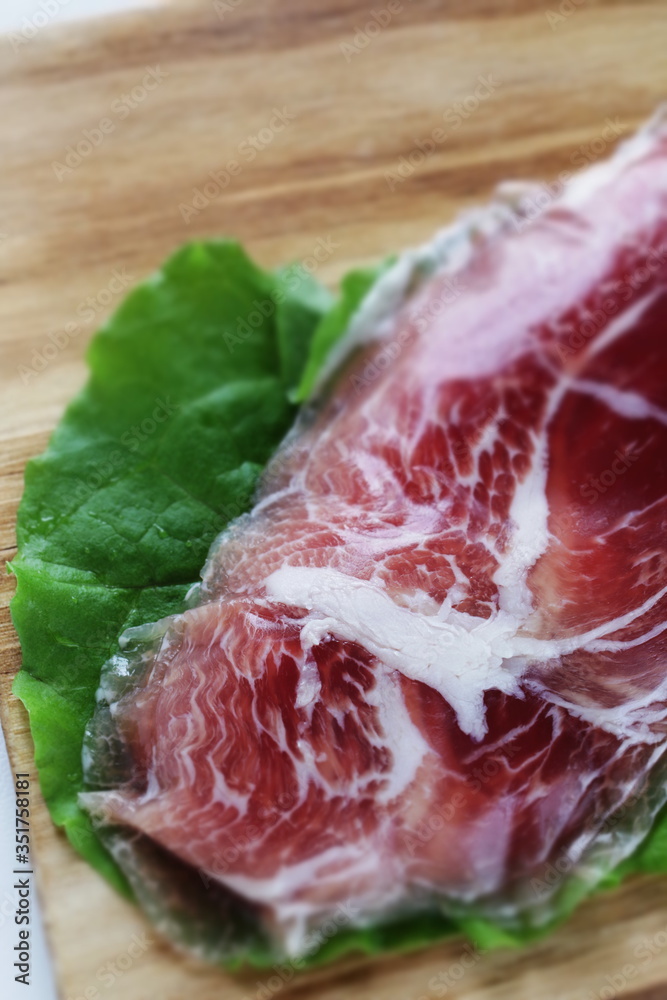 sliced ham on plate with copy space for gourmet sliced ham on plate with copy space for gourmet