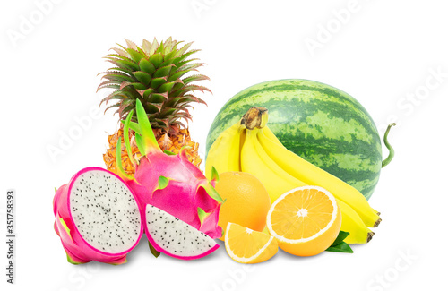 Mix Heap fruits Dragon and orange with the cut in half and slice and whole watermelon and pineapple isolated on white background