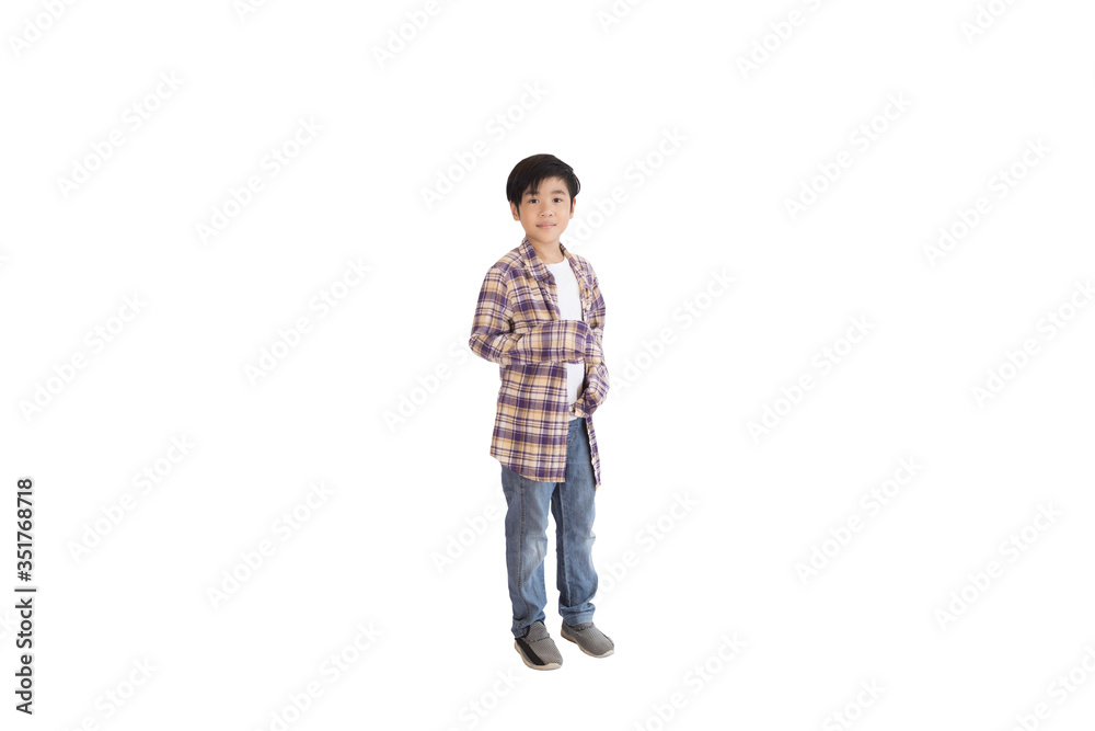 A portrait of a cute Asian elementary school student wearing jeans and a plaid shirt. A portrait of a cute Asian elementary school student wearing jeans and a plaid shirt.