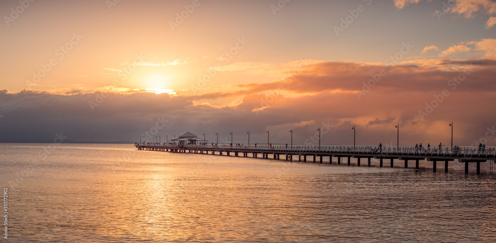 Panoramic Golden Sunrise with Jetty