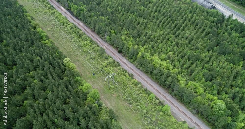 Establishing shot of train line carved into forest, Big Thicket National Preserve, Texas Establishing shot of train line carved into forest, Big Thicket National Preserve, Texas