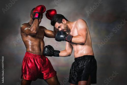 diverse boxing fighters fighting on ring in champion match