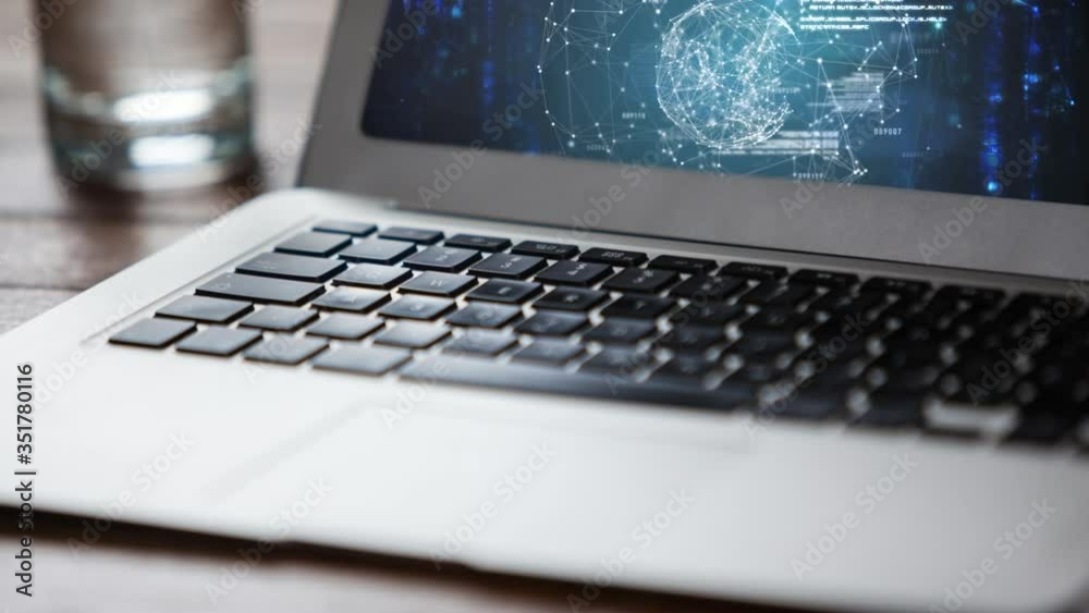 Animation of a laptop showing a web of connections on the screen