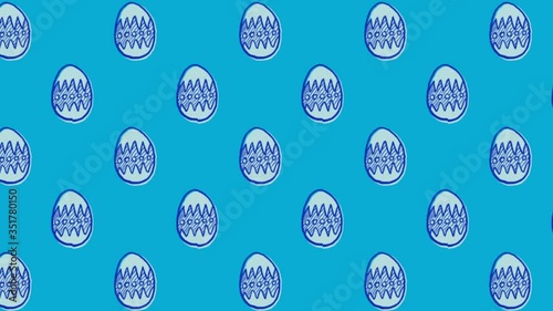 Animation of patterned Easter eggs moving in rows on blue background