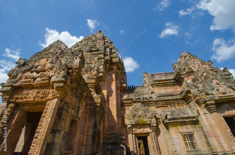 Details of old sandstone castle top in light