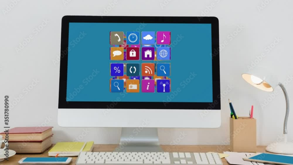 Animation of a laptop screen showing a colored icons cube rotating Animation of a laptop screen showing a colored icons cube rotating