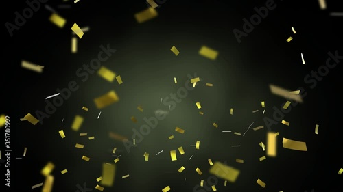 Animation of golden confetti falling down on black background photo