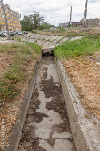 Ecological problems, global warming. Drought. Dry irrigation canal without water. Disaster, crop loss without water photo