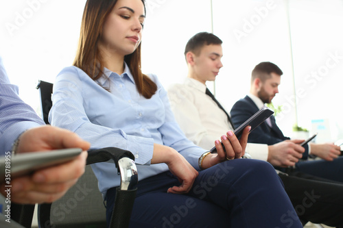 Group business people hold mobile device