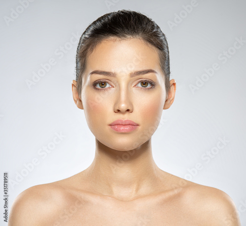 Wallpaper Mural Beautiful face of young caucasian woman with perfect health fresh skin