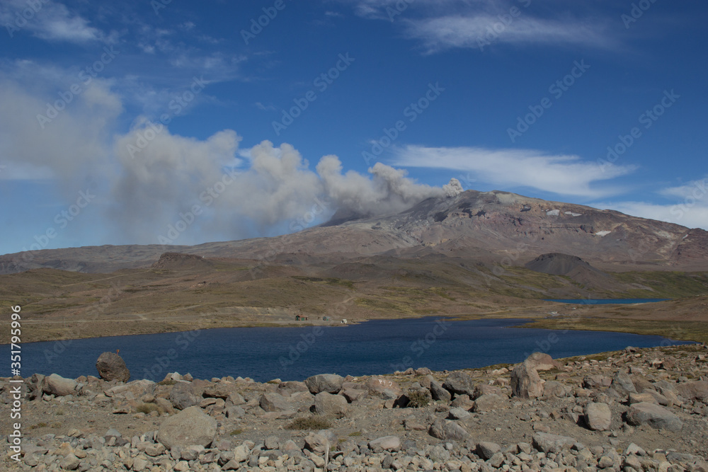 the crater of the volcano with smoke and ashes the crater of the volcano with smoke and ashes