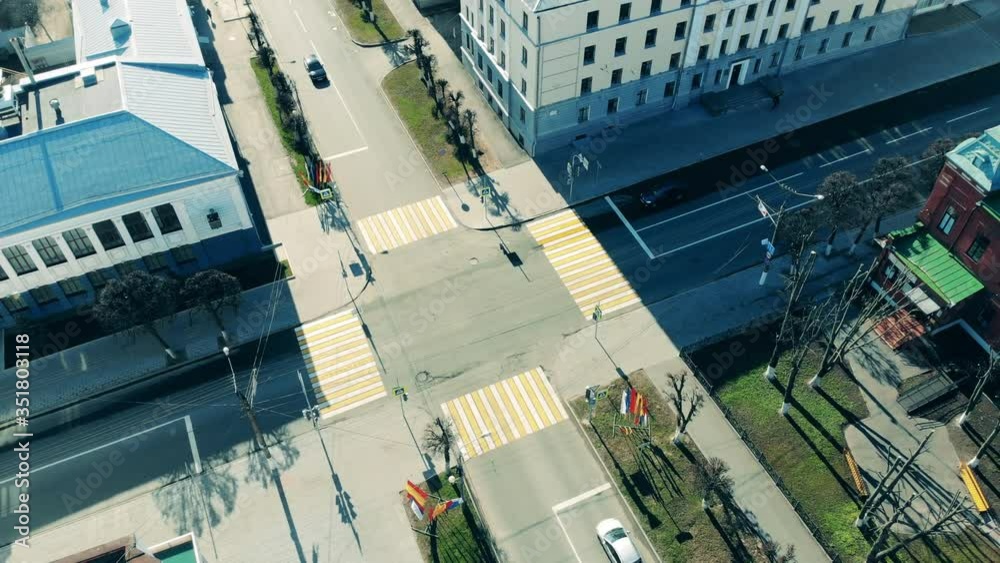 City crossroads with few cars in a view from above City crossroads with few cars in a view from above