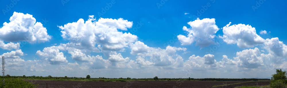 Blue sky panorama and beautiful clouds shape. Image for background and wallpaper.Blue sky with clouds background.Sky daylight. Natural sky composition. Element of design Blue sky panorama and beautiful clouds shape. Image for background and wallpaper.Blue sky with clouds background.Sky daylight. Natural sky composition. Element of design