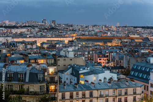 Photography Aerial view of the old town of Paris at night, view from the The Basilica of the