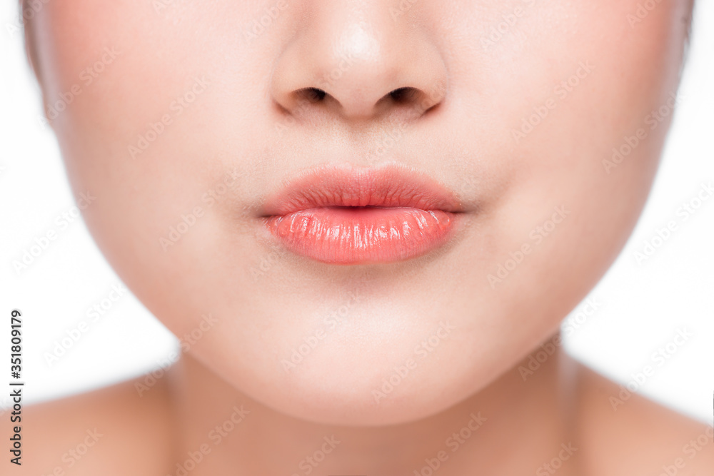 Young asian woman close up. Perfect natural lip makeup Young asian woman close up. Perfect natural lip makeup