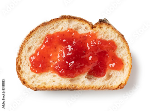 Strawberry jam and bread on a white background