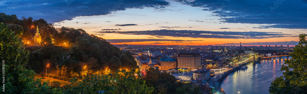  View of Podil district at sunset from New Pedestrian and Bicycle Bridge in Kyiv, Ukraine