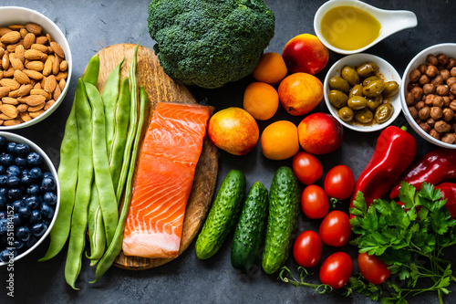 Ingredients of a Mediterranean diet. Fish, vegetables, nuts and berries