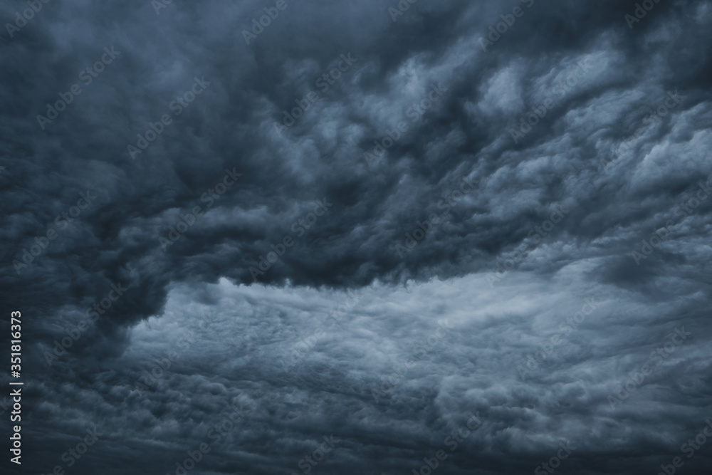 Dark dramatic clouds before a thunderstorm, hurricane, tornado.Abstract sky background.