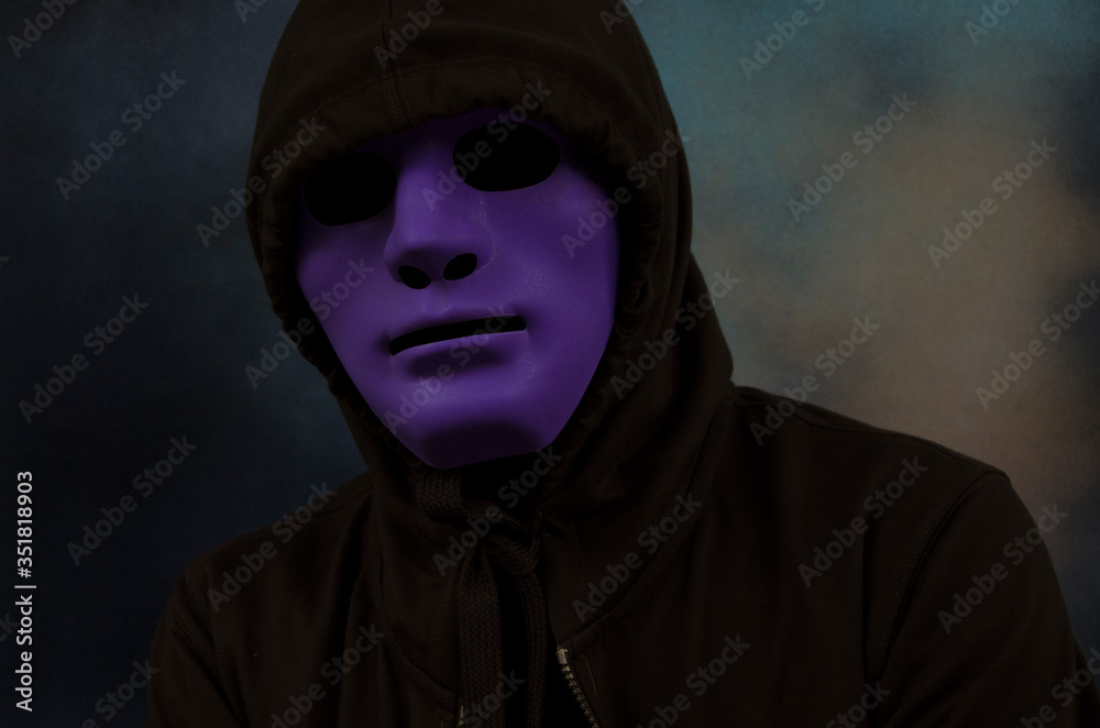 Mystery hollow man in violet mask and black coat Mystery hollow man in violet mask and black coat