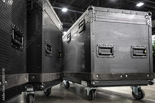 Concert equipment. Containers for transportation of equipment. Reinforced boxes on wheels. Containers with handles and wheels for easy transportation. Transportation of equipment for the stage.