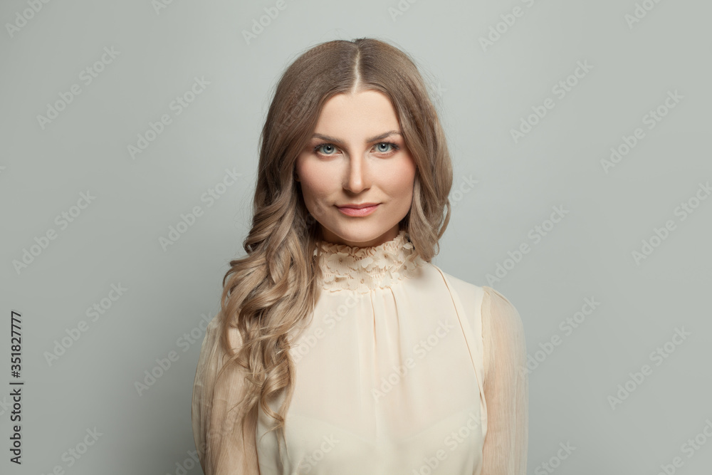 Portrait of smiling woman on white Portrait of smiling woman on white