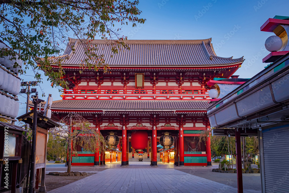 Tokyo. Japan. Asakusa temple in the evening. Japanese architecture. HOJO-mon gate. Walk in the Asakusa area. Streets Of Tokyo. Buddhist temples in Japan. Sensoji. Tourism in East Asia Tokyo. Japan. Asakusa temple in the evening. Japanese architecture. HOJO-mon gate. Walk in the Asakusa area. Streets Of Tokyo. Buddhist temples in Japan. Sensoji. Tourism in East Asia