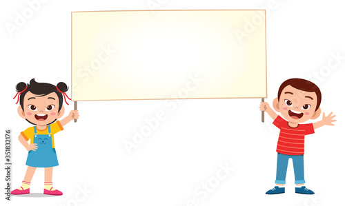 happy cute kid boy and girl holding blank banner