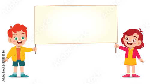 happy cute kid boy and girl holding blank banner