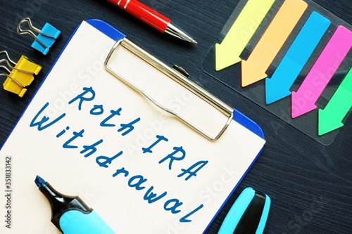 Financial concept about Roth IRA Withdrawal with sign on the piece of paper.