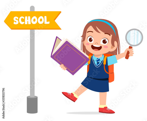 cute little kid with school direction board