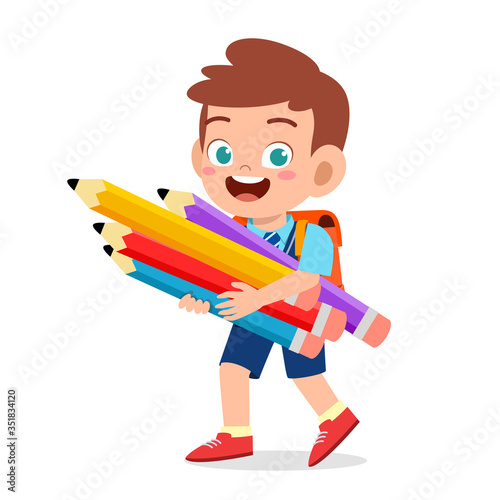 happy cute little kid boy with pencil
