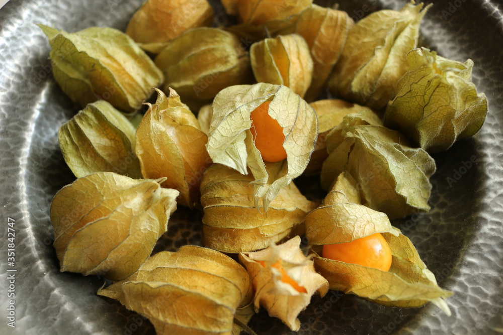 Physalis or goldenberries in a bowl Physalis or goldenberries in a bowl