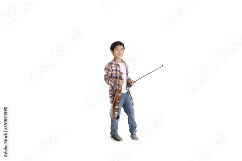 A portrait of a cute Asian elementary school student wearing a jeans and wearing a plaid shirt holding a violin. An isolated image with white background.
