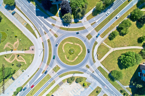 Aerial view of traffic roundabout intersection photo