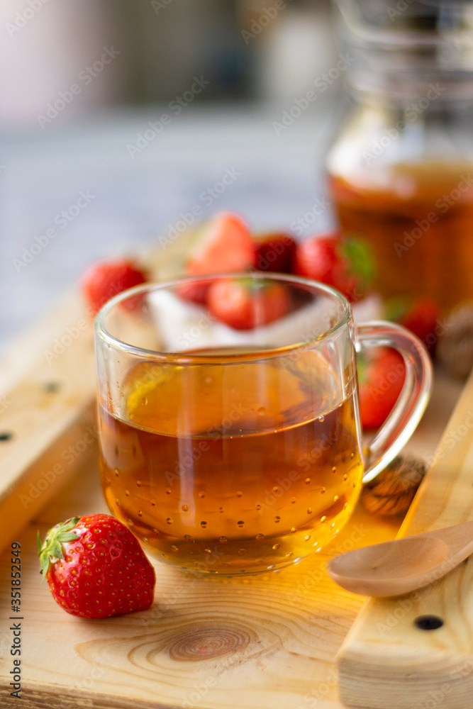hot black tea with strawberries hot black tea with strawberries