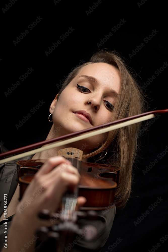 Dedicated passionate professional female violinist Dedicated passionate professional female violinist
