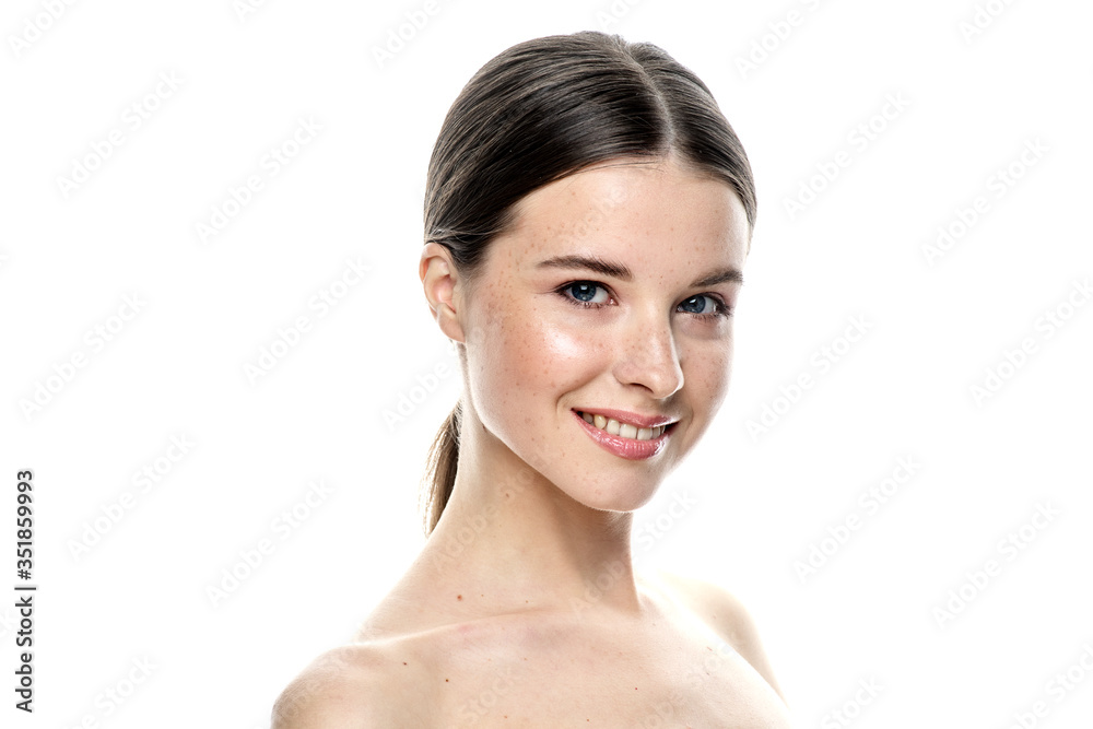 A close-up portrait of a girl with freckles and clear skin. Light blue eyes. The girl has different emotions, she looks at the camera. Isolated on a white background A close-up portrait of a girl with freckles and clear skin. Light blue eyes. The girl has different emotions, she looks at the camera. Isolated on a white background