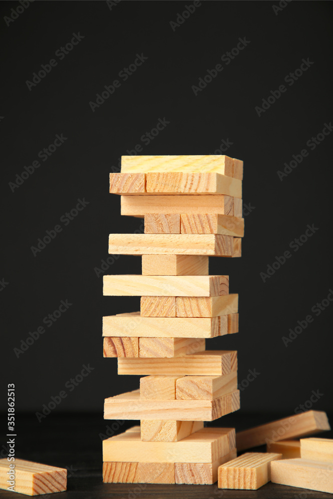 Business risk concept with wood jenga game. Top view Business risk concept with wood jenga game. Top view