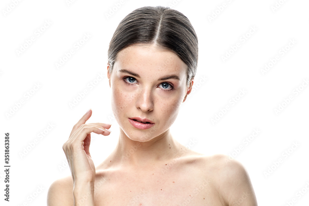 a close-up portrait of a young girl with clear skin. Isolated on a white background a close-up portrait of a young girl with clear skin. Isolated on a white background