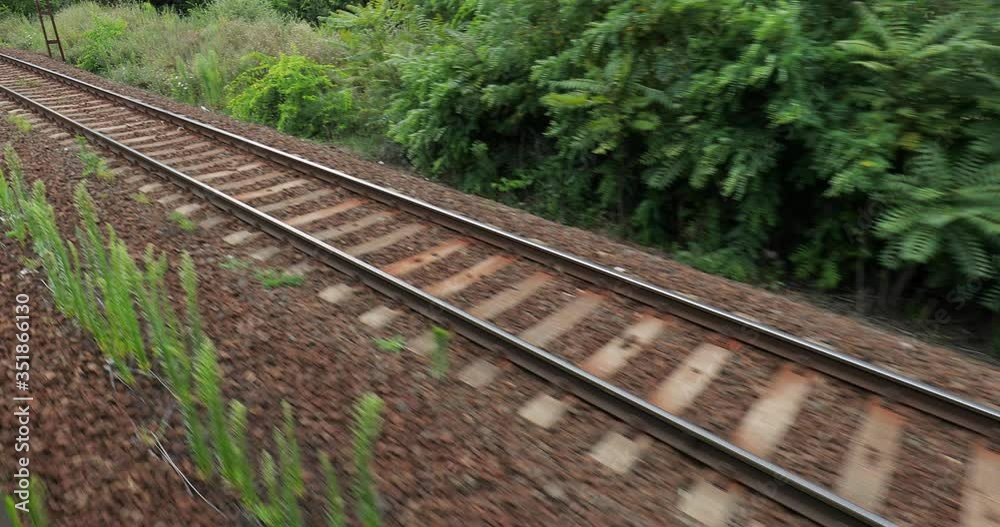 Rails passing by, closeup view, slow motion from 60fps footage Rails passing by, closeup view, slow motion from 60fps footage