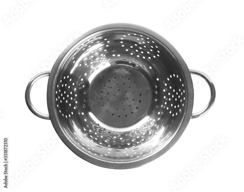 New shiny colander isolated on white, top view. Cooking utensil