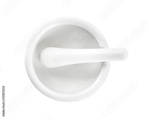 Fotografia New ceramic mortar with pestle isolated on white, top view Cooking utensils