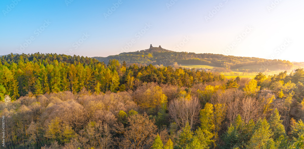 Fototapeta premium Trosky castle ruins. Two towers of old medieval castle on the hill. Landscape of Bohemian Paradise, Czech: Cesky raj, Czech Republic