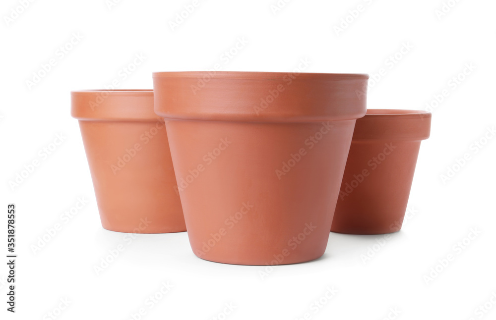Stylish terracotta flower pots isolated on white Stylish terracotta flower pots isolated on white