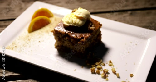 Sliced piece of carrot cake on a plate