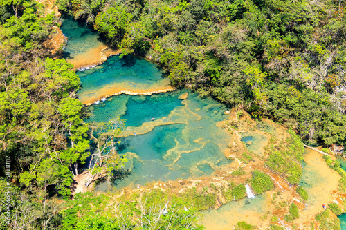 Semuc champey natural pools and forest scene from the heights of viewpoint photo