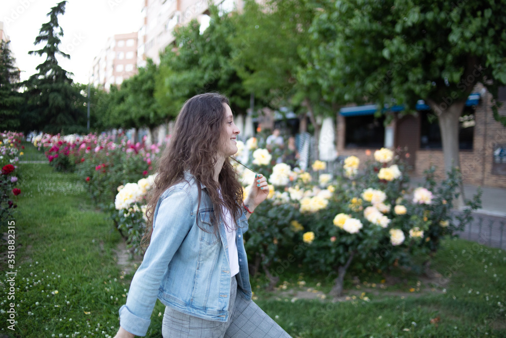portrait of a girl in denim clothes outdoors
